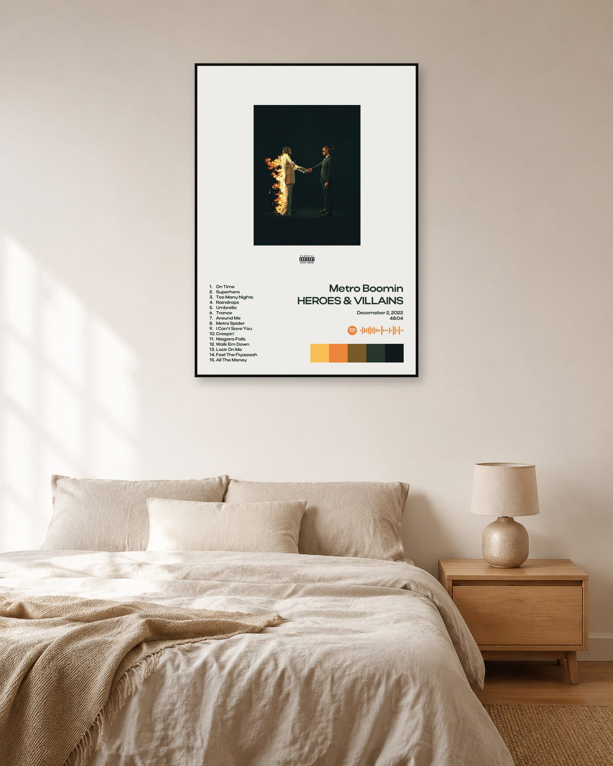 Metro Boomin Heroes & Villains White Minimal Tracklist Poster — natural-light bedroom display. Print sold unframed; frame for display only.