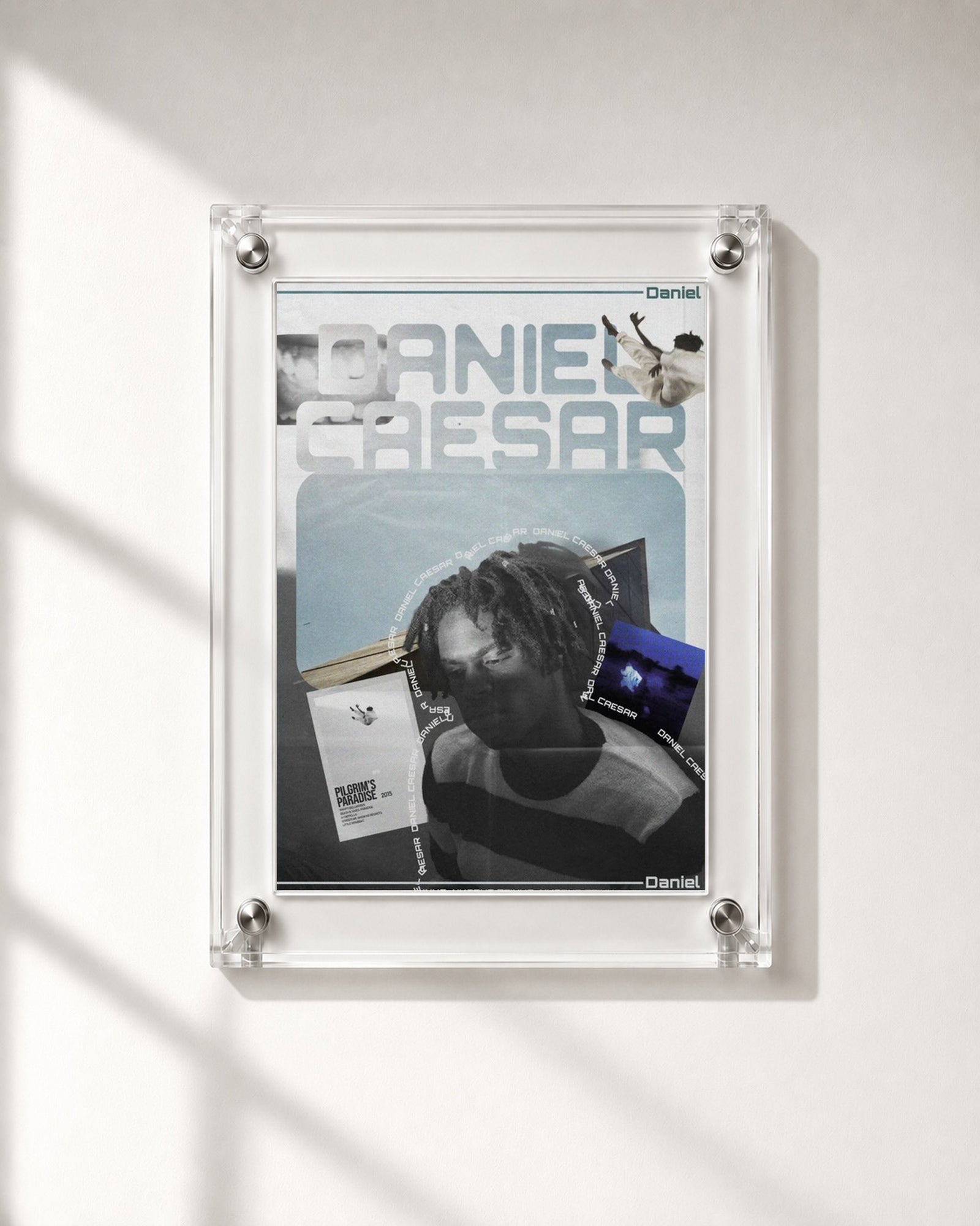 Daniel Caesar Blue Album Collage Poster, close-up display. Frame for display only; poster sold unframed.