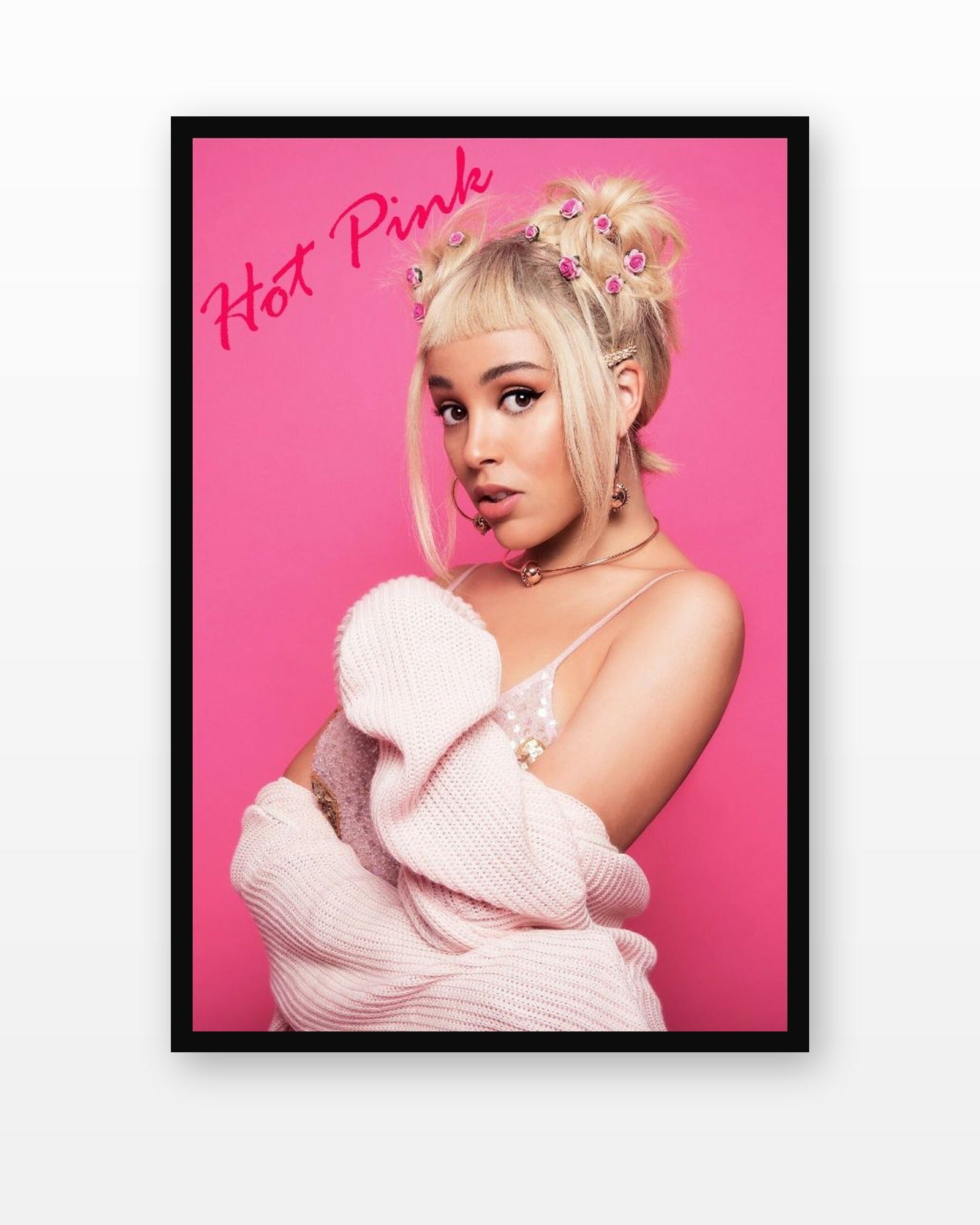 Doja Cat Hot Pink Portrait Poster in a black frame on a white wall
