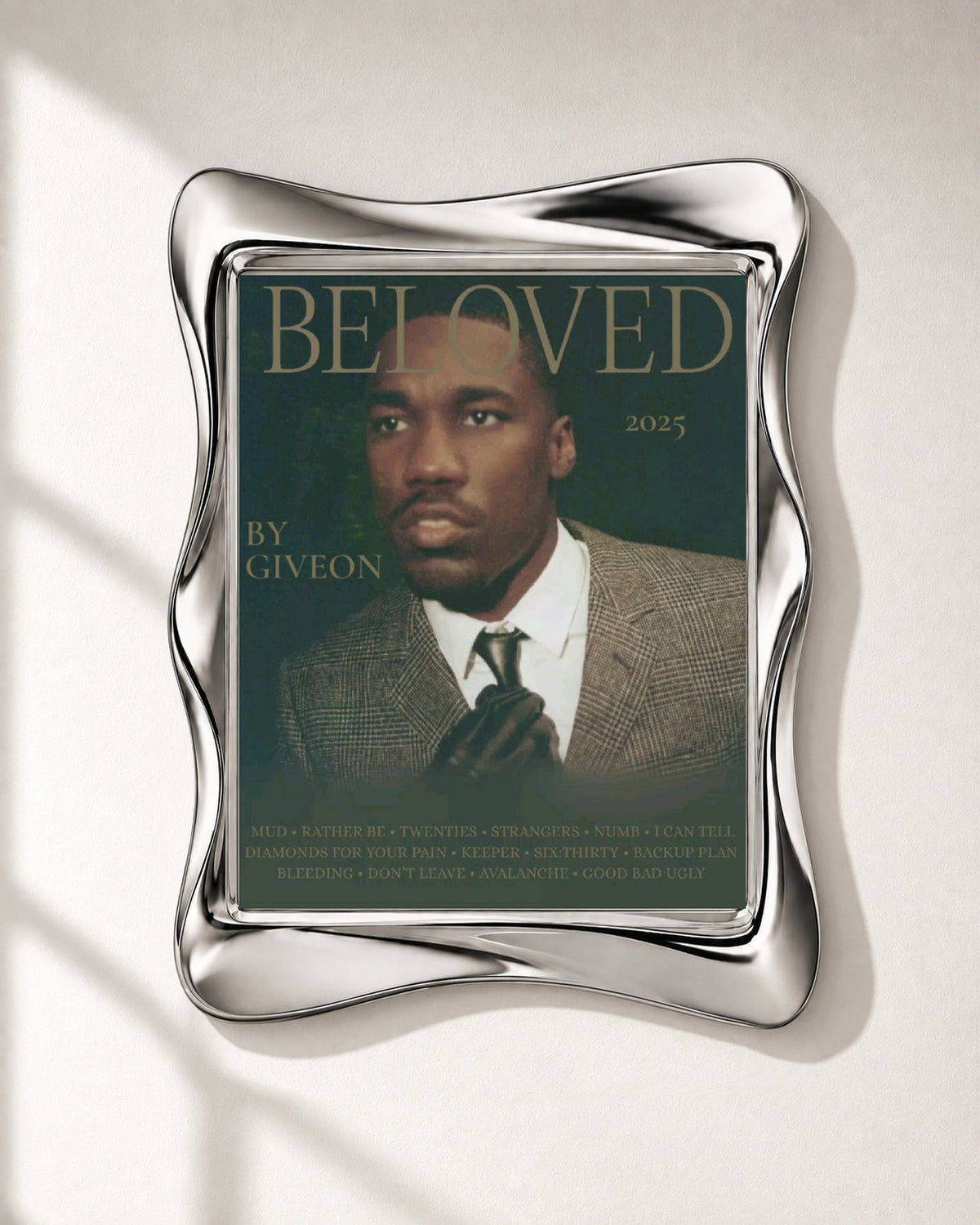 GIVĒON BELOVED Olive Typography Portrait Poster; frame close-up; silver wave frame for display only. Print sold unframed.