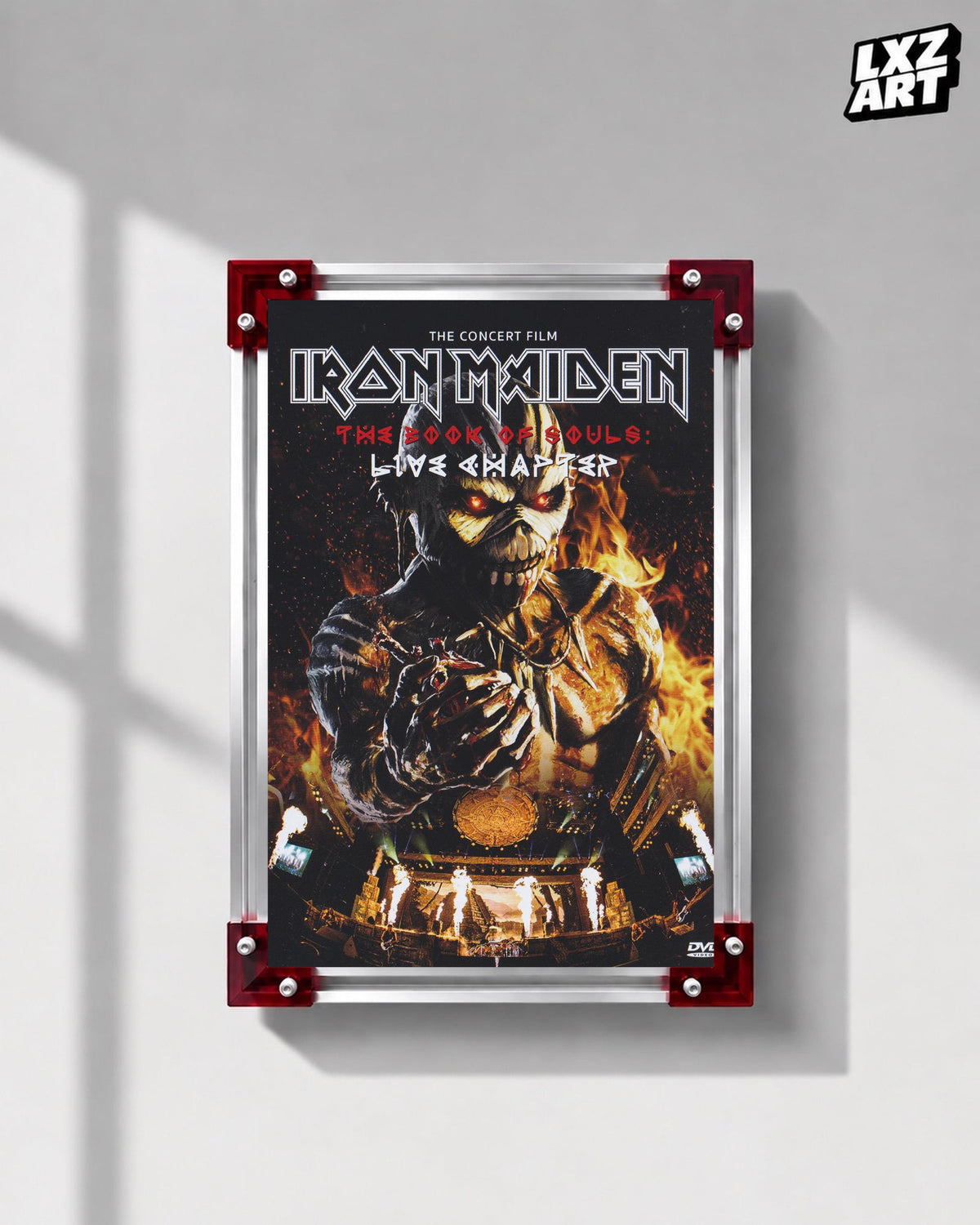 Iron Maiden The Book of Souls Live Chapter Concert Film poster displayed on a gray wall in a red-corner frame; unframed print, frame not included
