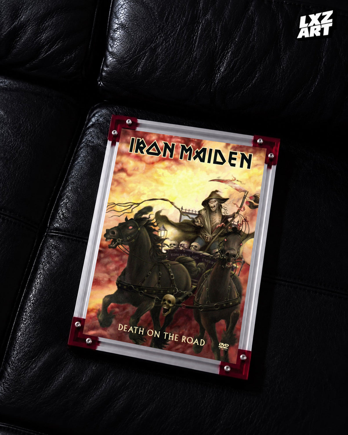 Iron Maiden Death on the Road Concert Film poster displayed on a black leather sofa in a red-corner frame; unframed print, frame not included
