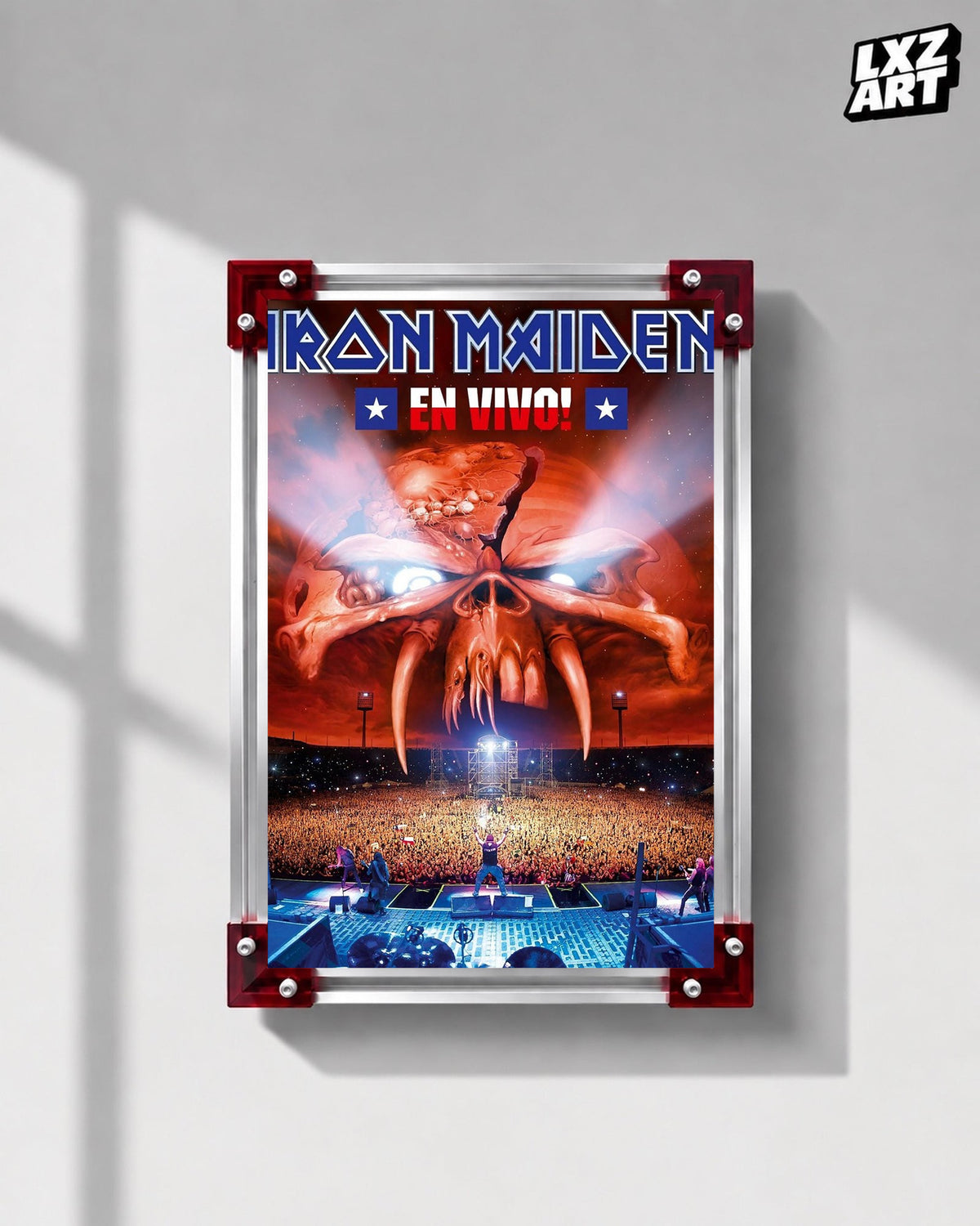 Iron Maiden En Vivo Concert Film poster displayed on a gray wall in a red-corner frame; unframed print, frame not included