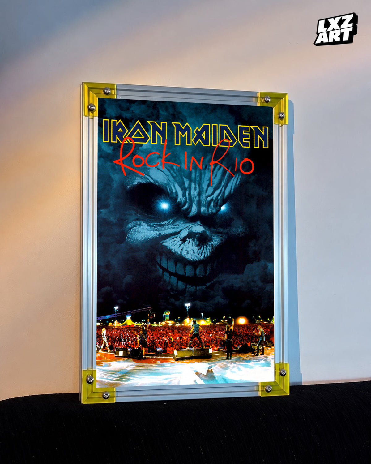 Iron Maiden Rock in Rio Concert Film poster displayed against a warm wall in a yellow-corner frame; unframed print, frame not included