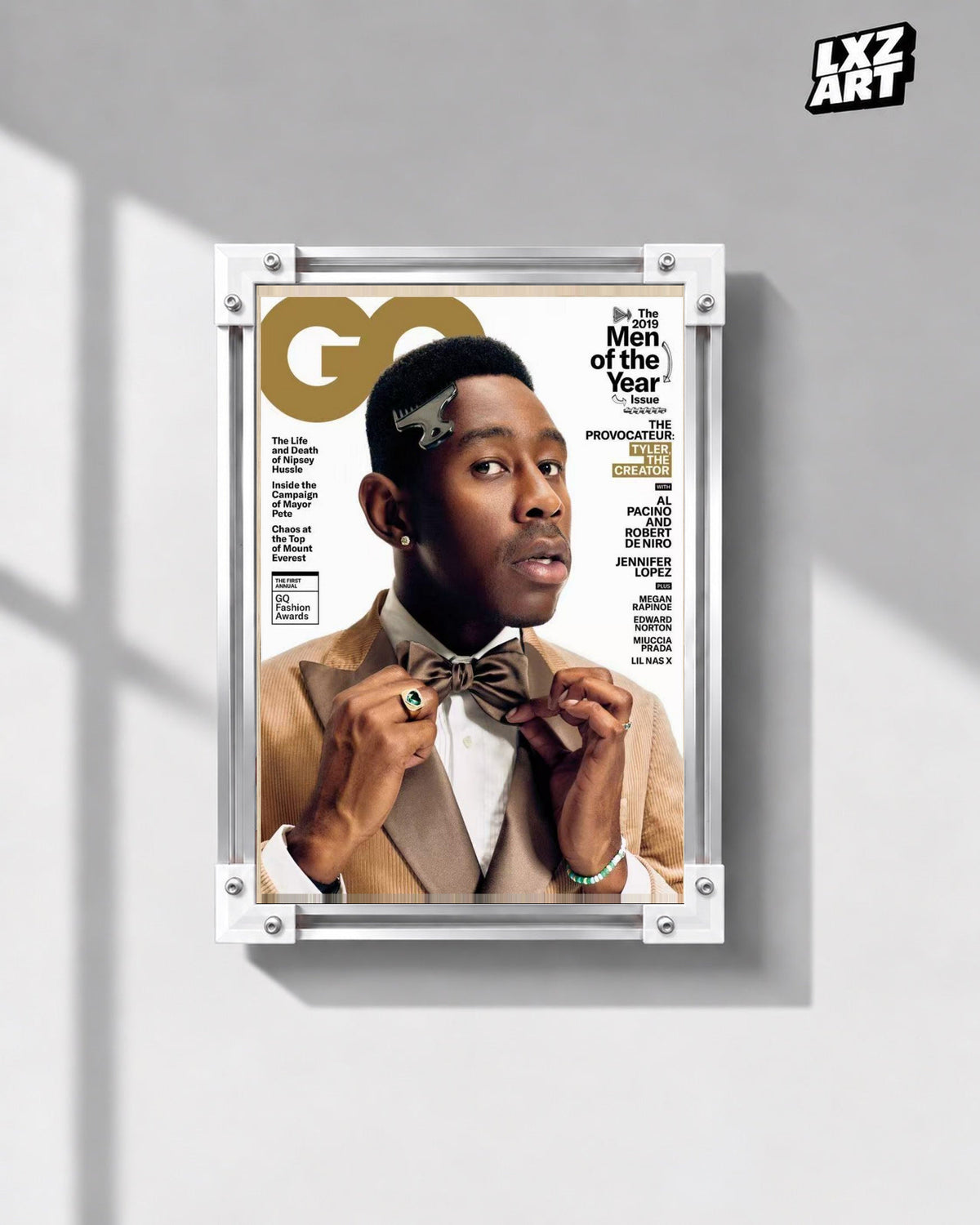 Tyler, The Creator Fashion Portrait Poster in white-corner frame on gray wall. Frame shown for display only.
