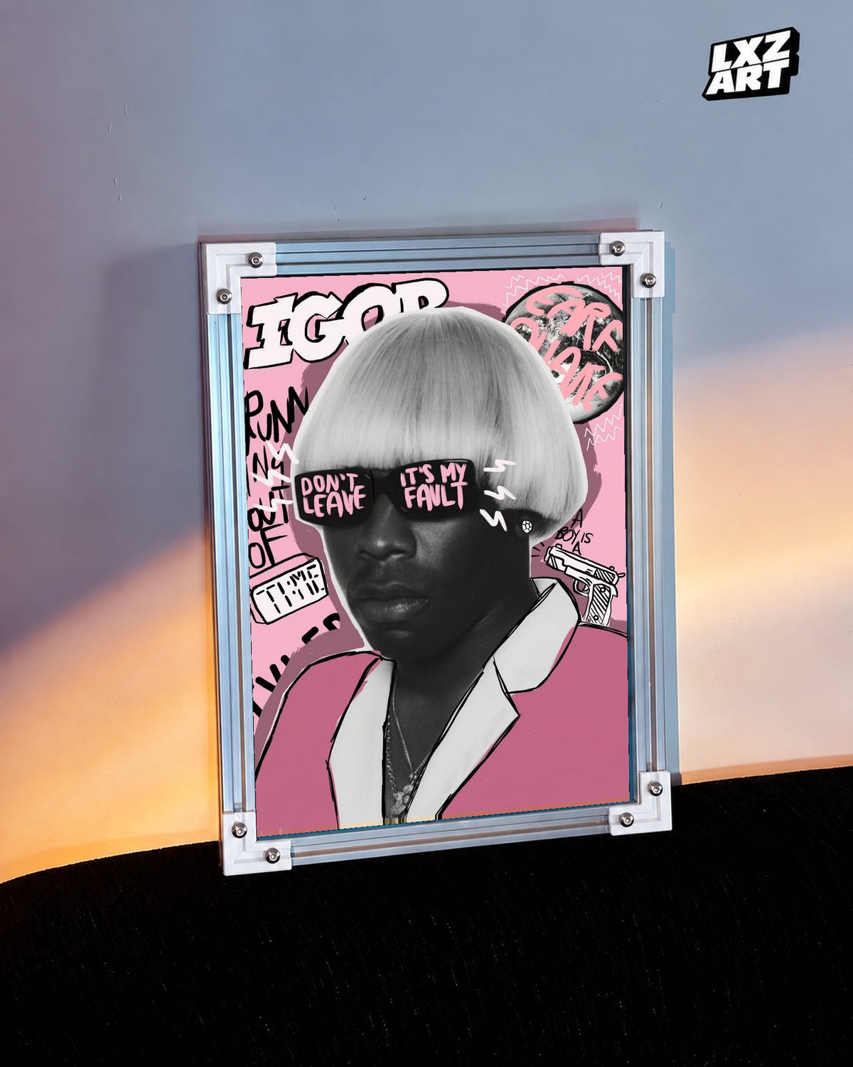 Tyler, The Creator IGOR Portrait Poster in white-corner frame on warm-lit wall. Frame shown for display only.