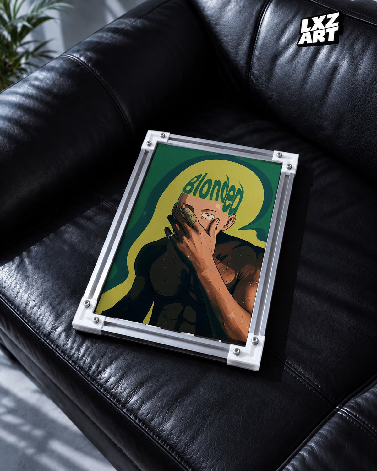 Frank Ocean Blonded Anime-Inspired Poster in white-corner frame on black leather sofa. Frame shown for display only.