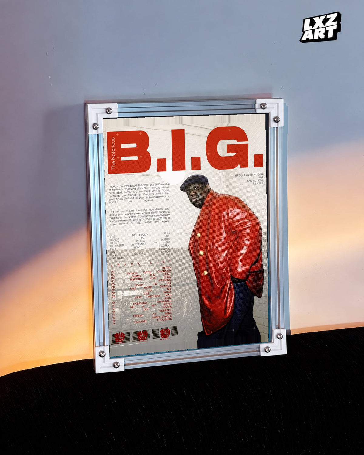 The Notorious B.I.G. Ready to Die Red Jacket Tracklist Poster in white-corner frame beside warm-lit wall. Frame shown for display only.