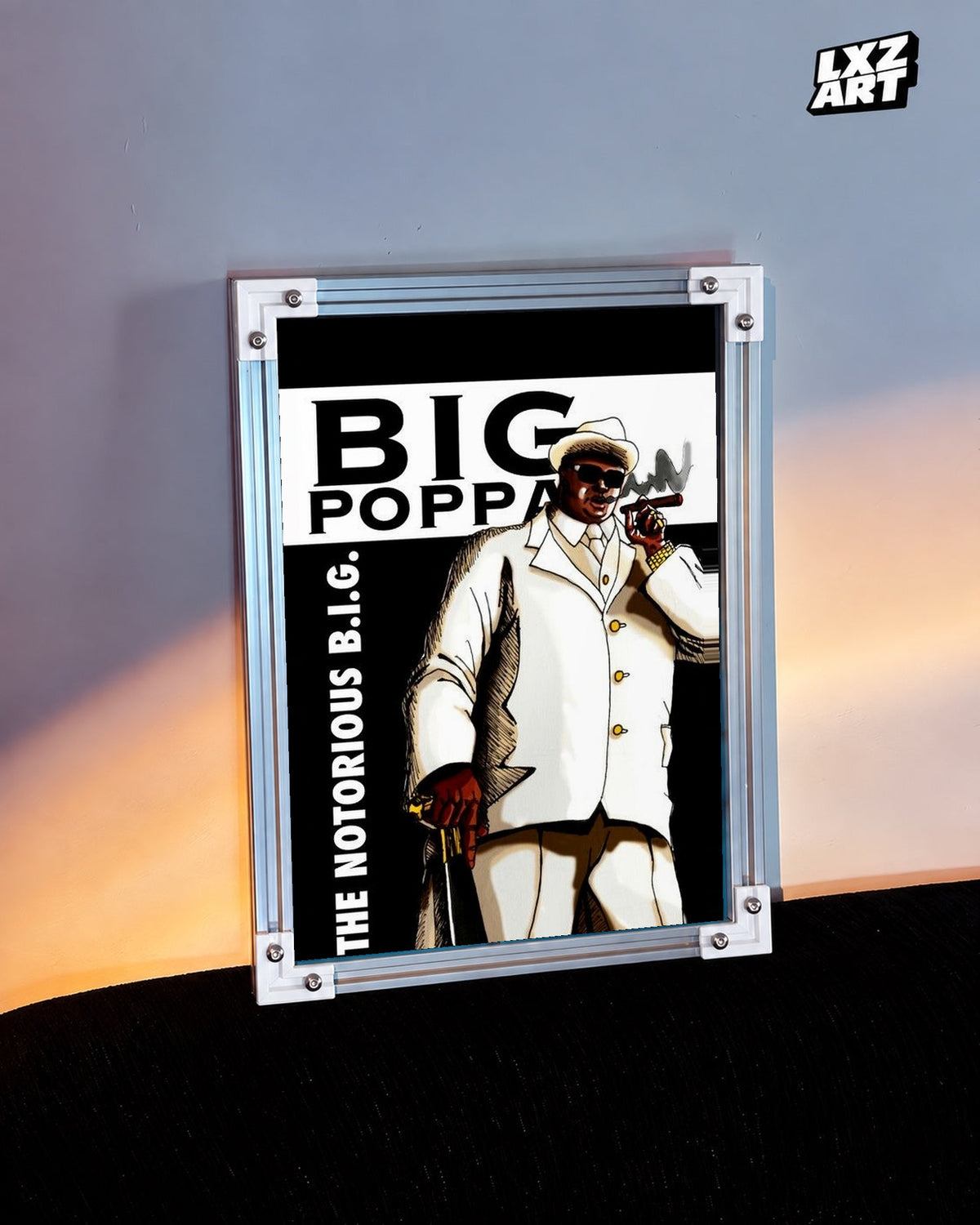 The Notorious B.I.G. Big Poppa White Suit Illustration Poster in white-corner frame beside warm-lit wall. Frame shown for display only.