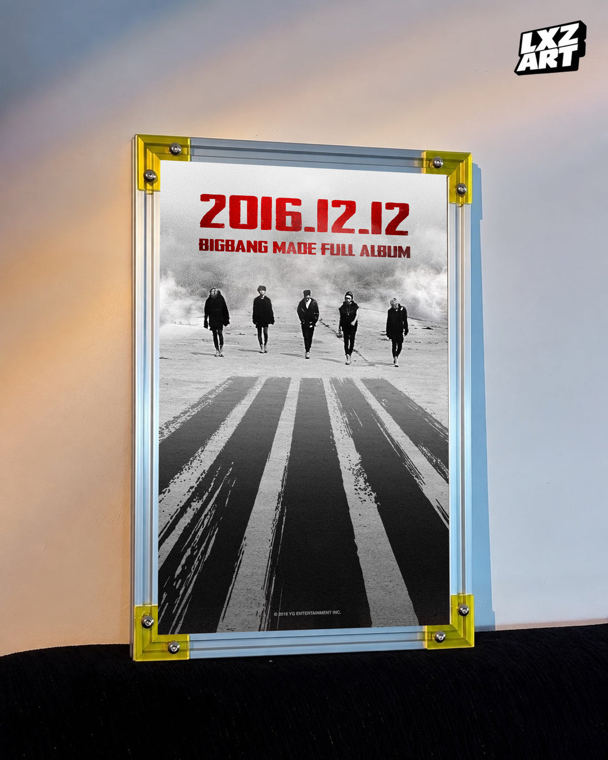 BIGBANG MADE Full Album Monochrome Road Poster displayed against a warm wall in a yellow-corner frame; unframed print, frame not included