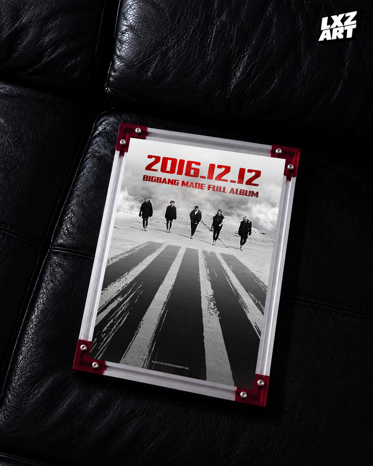 BIGBANG MADE Full Album Monochrome Road Poster displayed on a black leather sofa in a red-corner frame; unframed print, frame not included