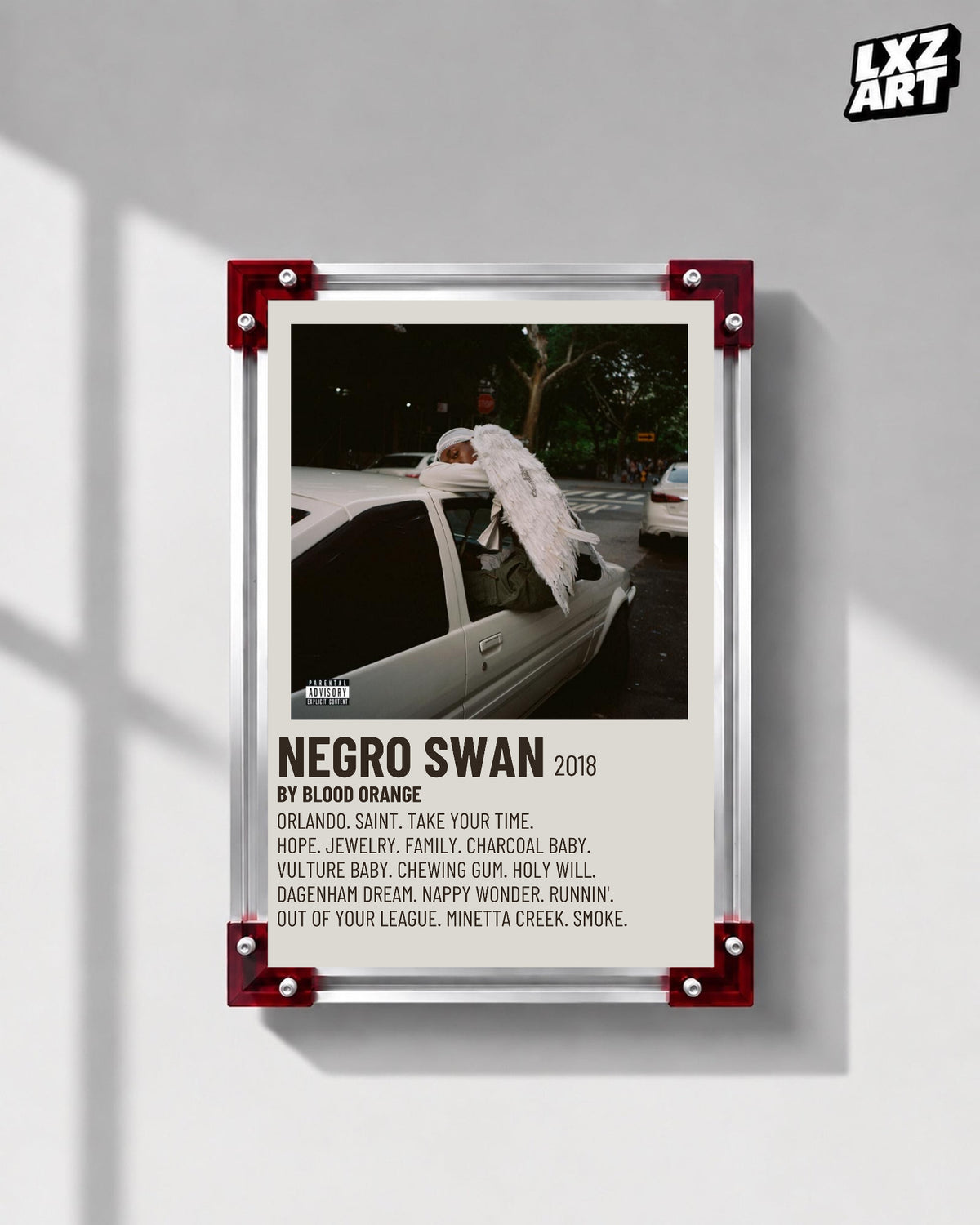 Blood Orange Negro Swan cream tracklist poster displayed on a gray wall in the red-corner frame; unframed print, frame not included