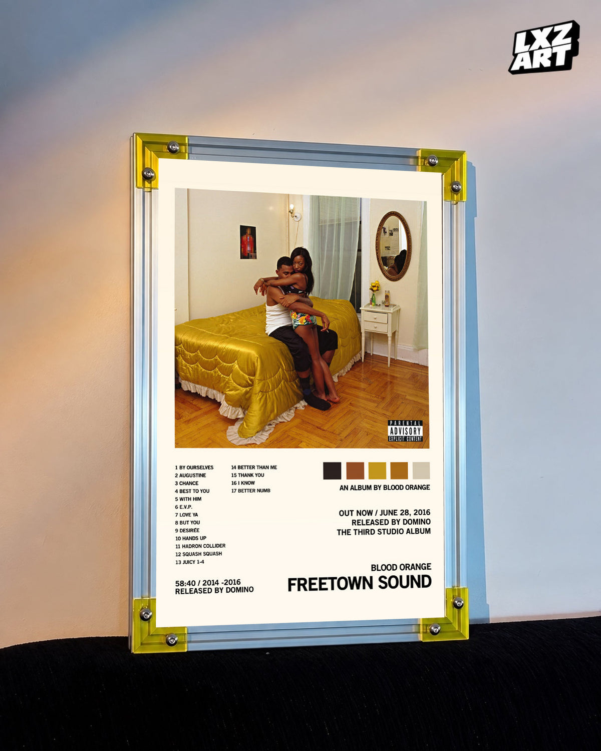 Blood Orange Freetown Sound cream palette tracklist poster displayed against a warm-lit wall in the yellow-corner frame; unframed print, frame not included