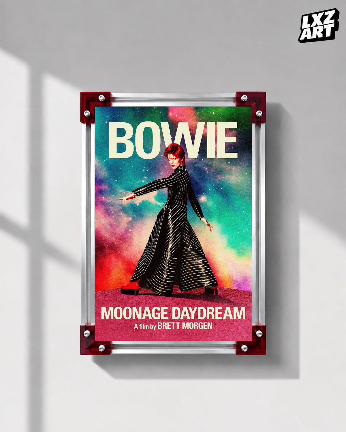 David Bowie Moonage Daydream Striped Suit poster displayed on gray wall with red frame corners; frame not included