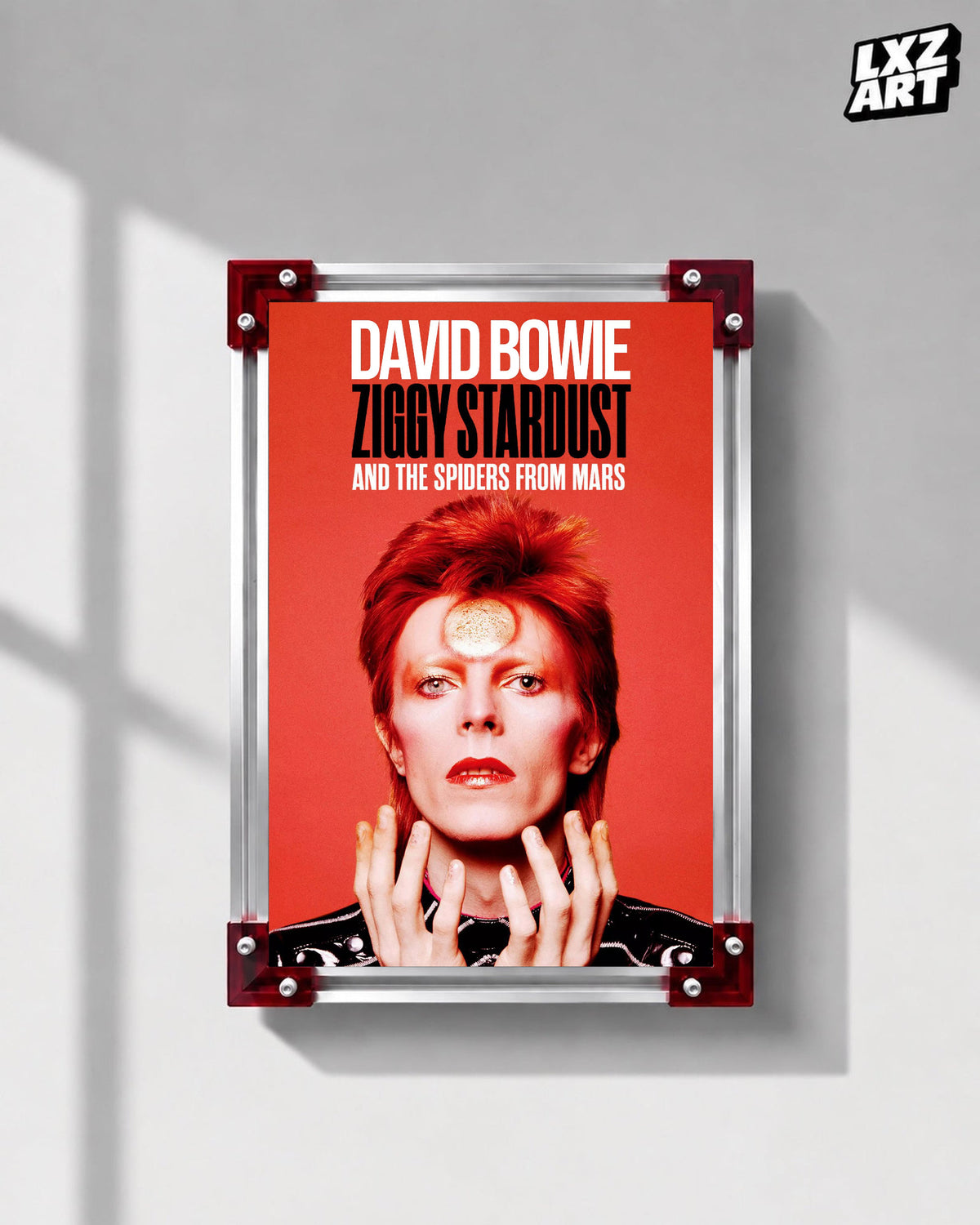 David Bowie Ziggy Stardust Red Portrait poster displayed on gray wall with red frame corners; frame not included