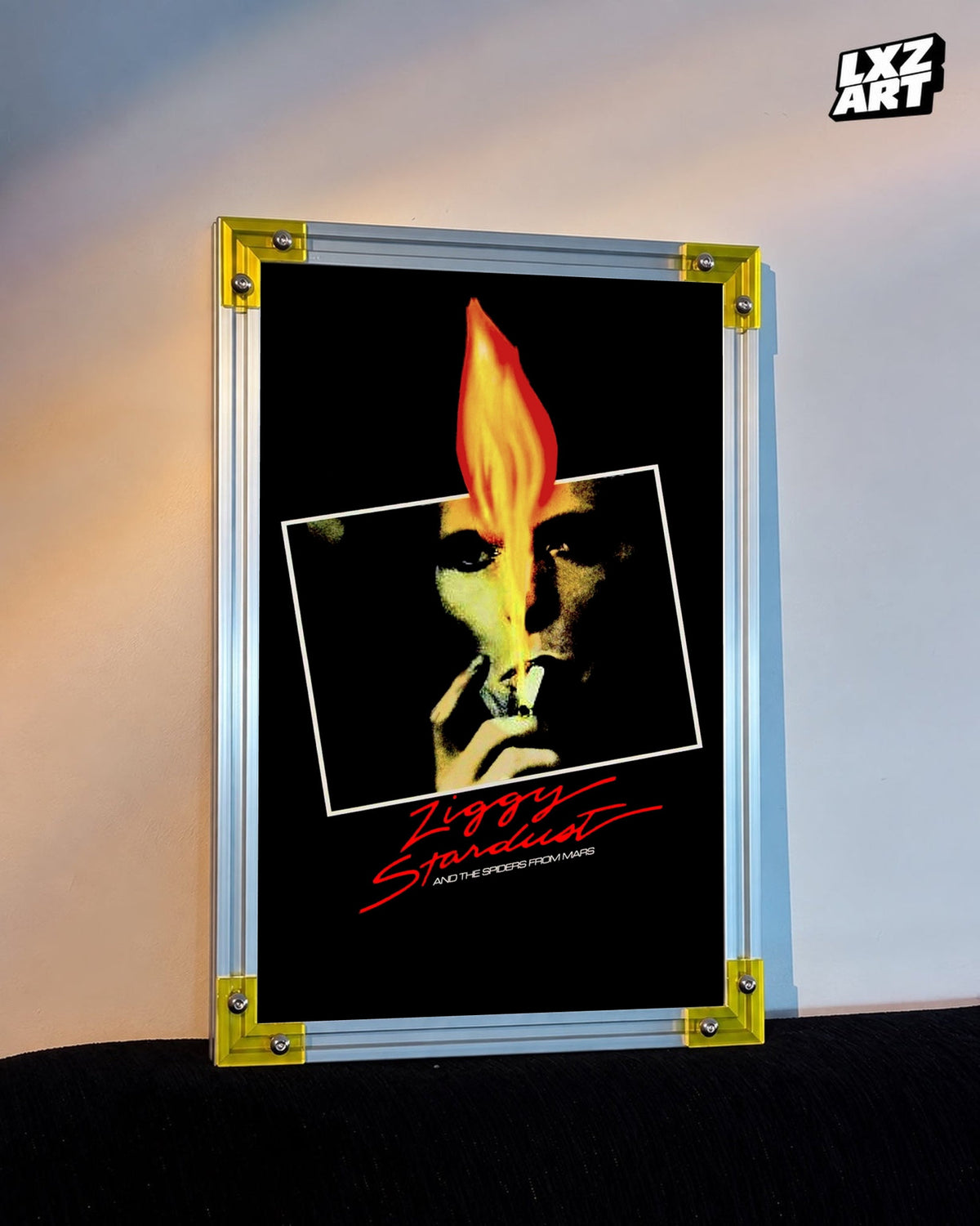 David Bowie Ziggy Stardust Flame Portrait poster displayed on warm wall with yellow frame corners; frame not included
