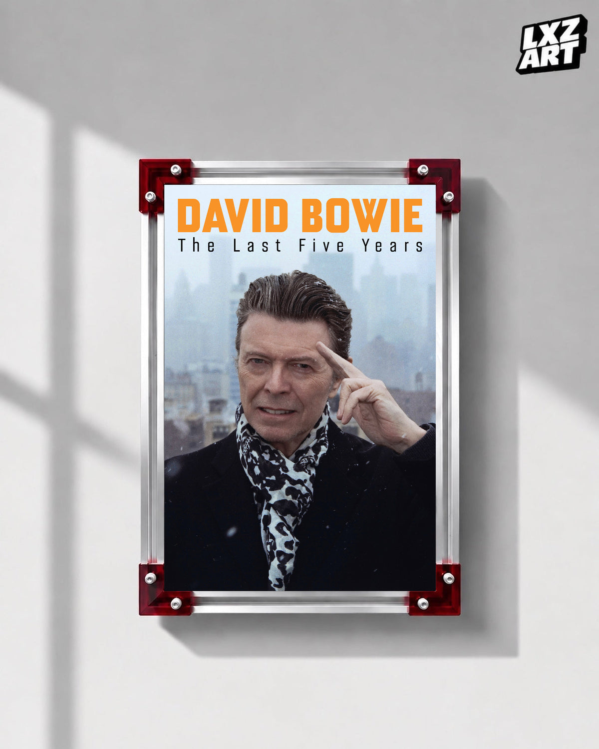 David Bowie The Last Five Years Portrait poster displayed on gray wall with red frame corners; frame not included