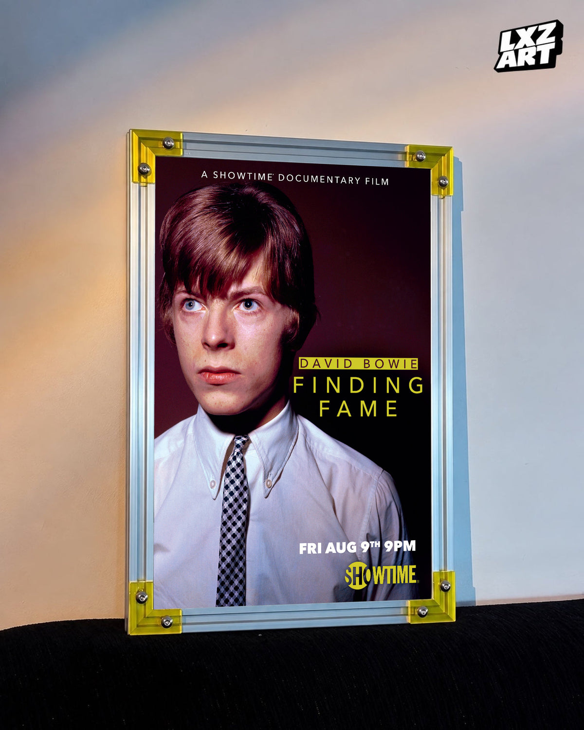 David Bowie Finding Fame Portrait poster displayed on warm wall with yellow frame corners; frame not included