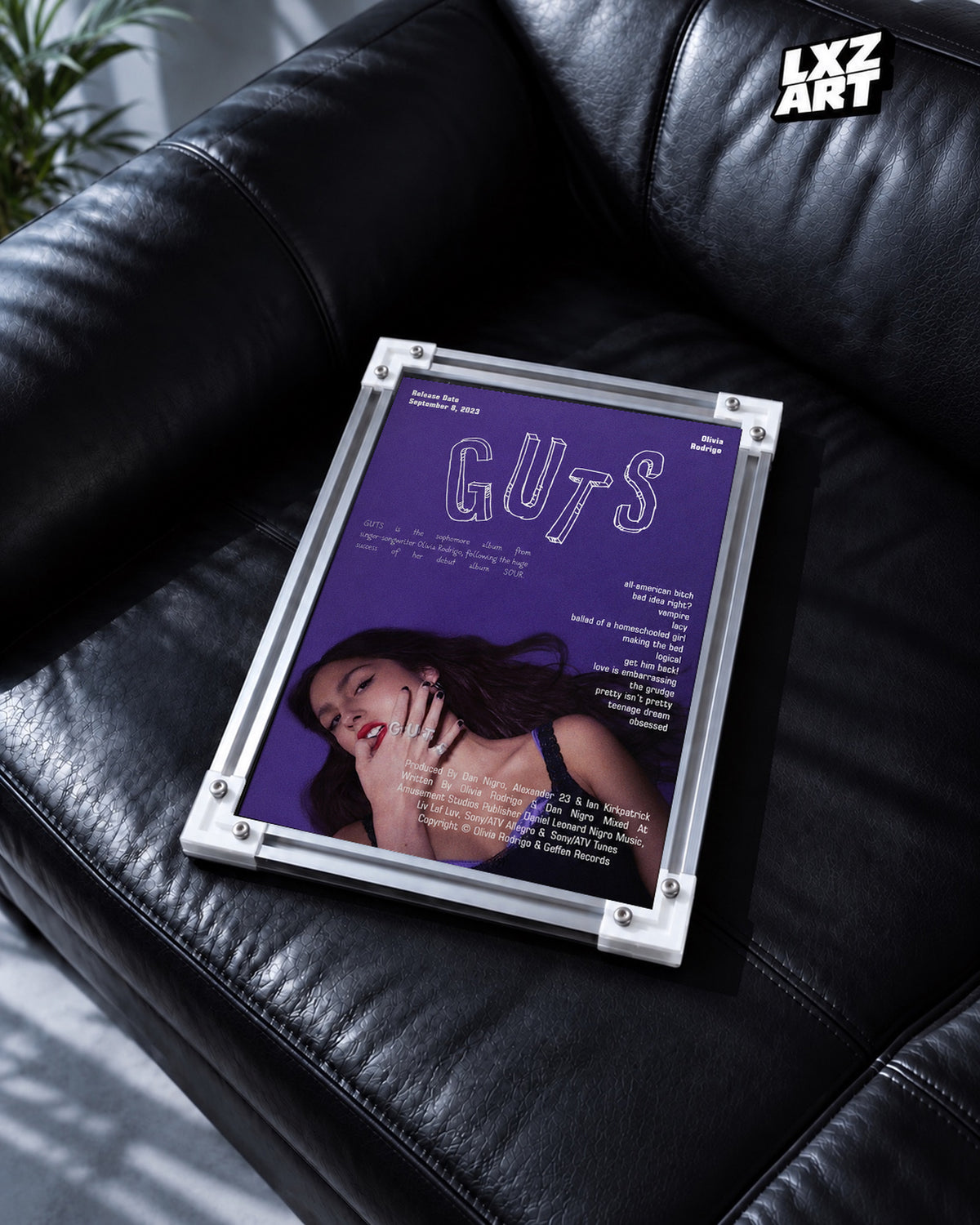Olivia Rodrigo GUTS Tracklist Poster | Unframed Bedroom Wall Art — black leather sofa display; unframed print, frame not included
