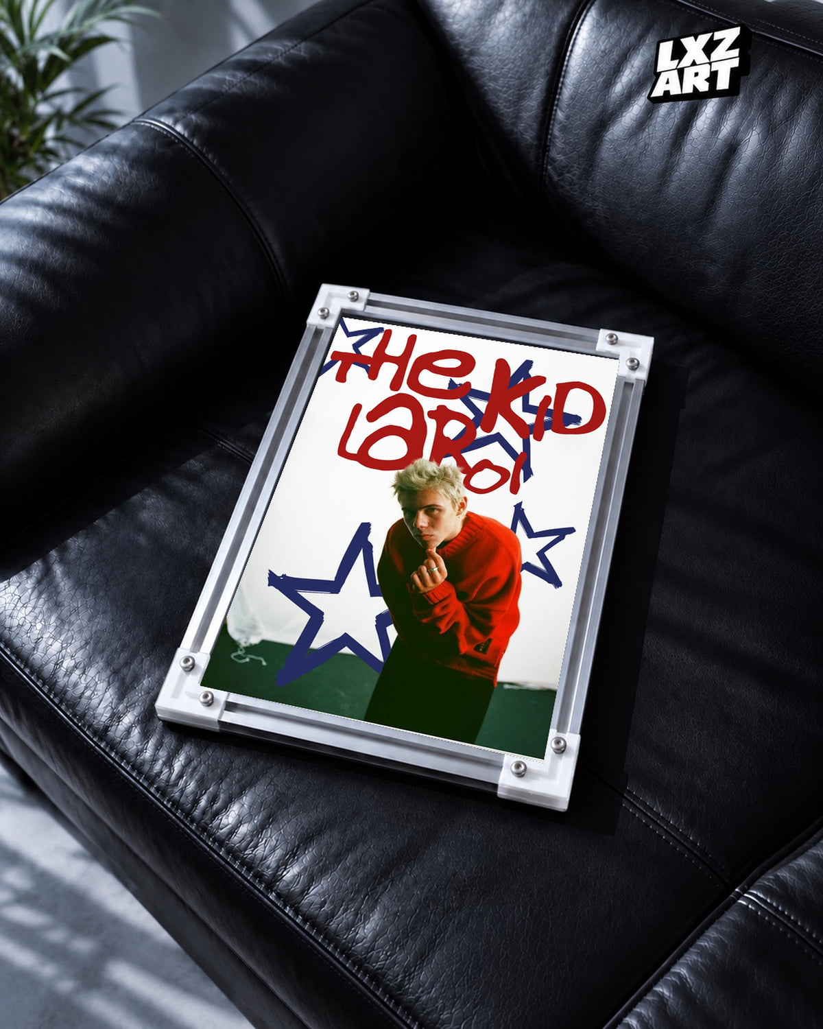 The Kid LAROI Red Sweater and Blue Stars Poster | Unframed — black leather sofa display; unframed print, frame not included