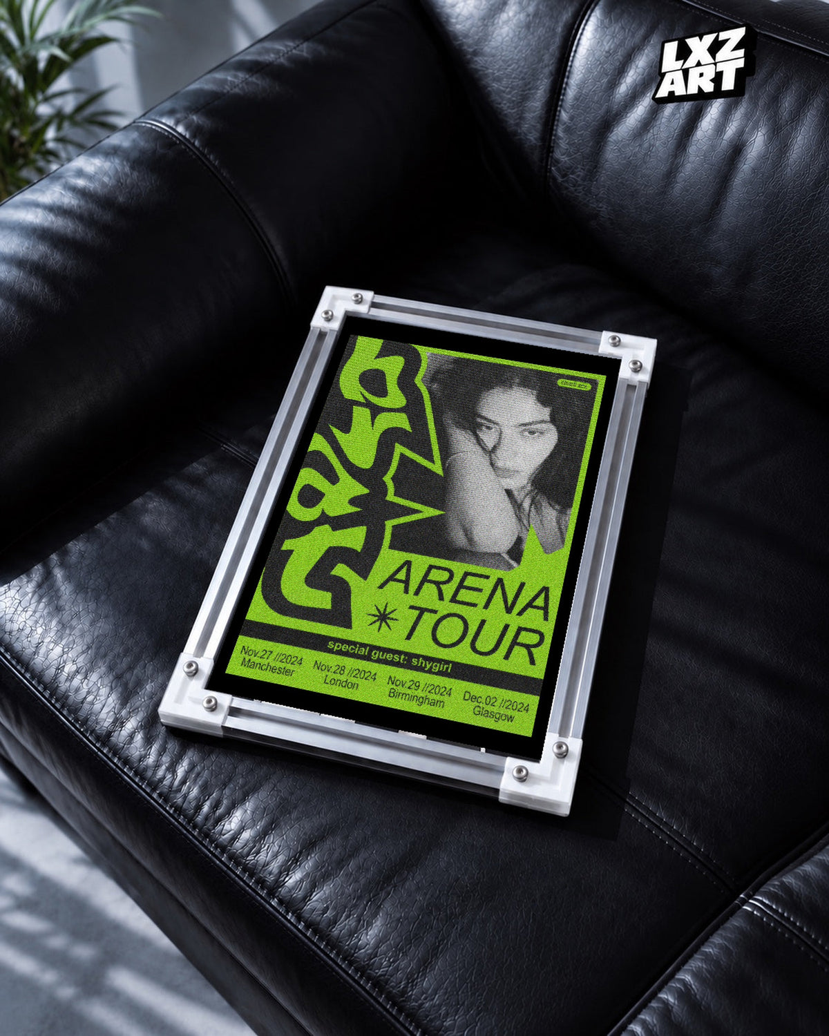 Charli xcx Brat Arena Tour Green Portrait unframed poster shown in the black leather sofa display.
