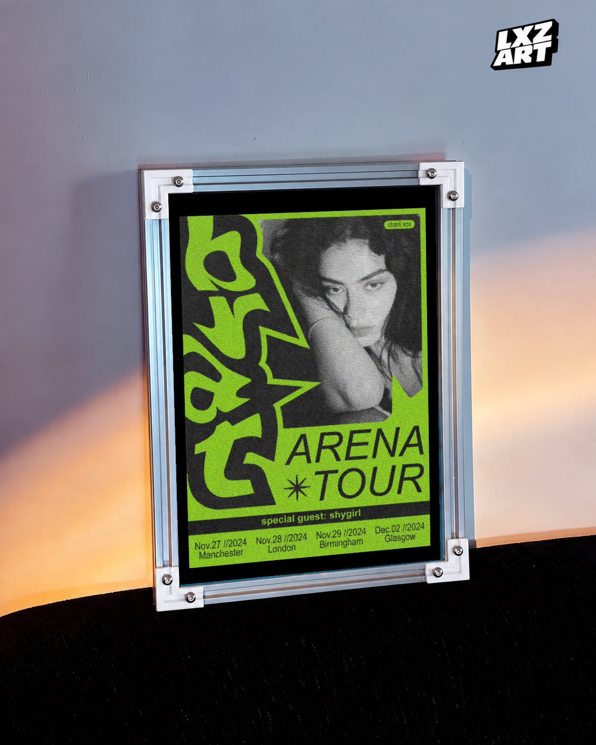 Charli xcx Brat Arena Tour Green Portrait unframed poster shown in the warm-lit wall display.