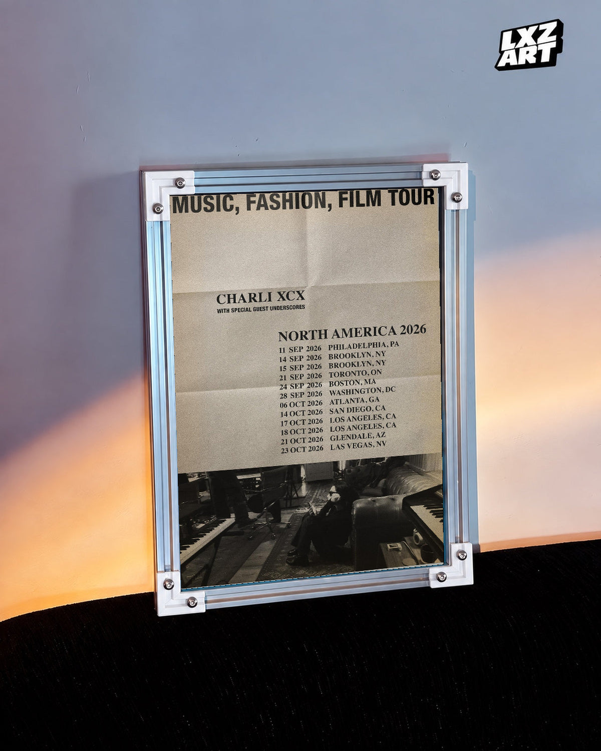 Charli xcx Music Fashion Film 2026 Tour unframed poster shown in the warm-lit wall display.