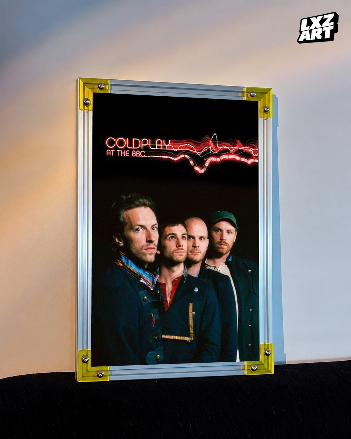 Coldplay At the BBC 2008 Poster displayed against a warm wall in a yellow-corner frame; unframed print, frame not included
