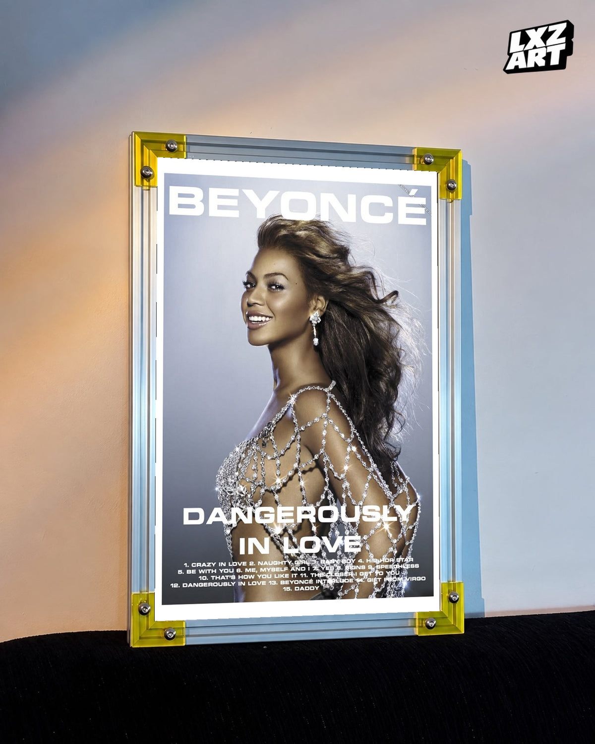 Beyoncé Dangerously in Love tracklist poster displayed against a warm wall in a yellow corner frame; unframed print, frame not included