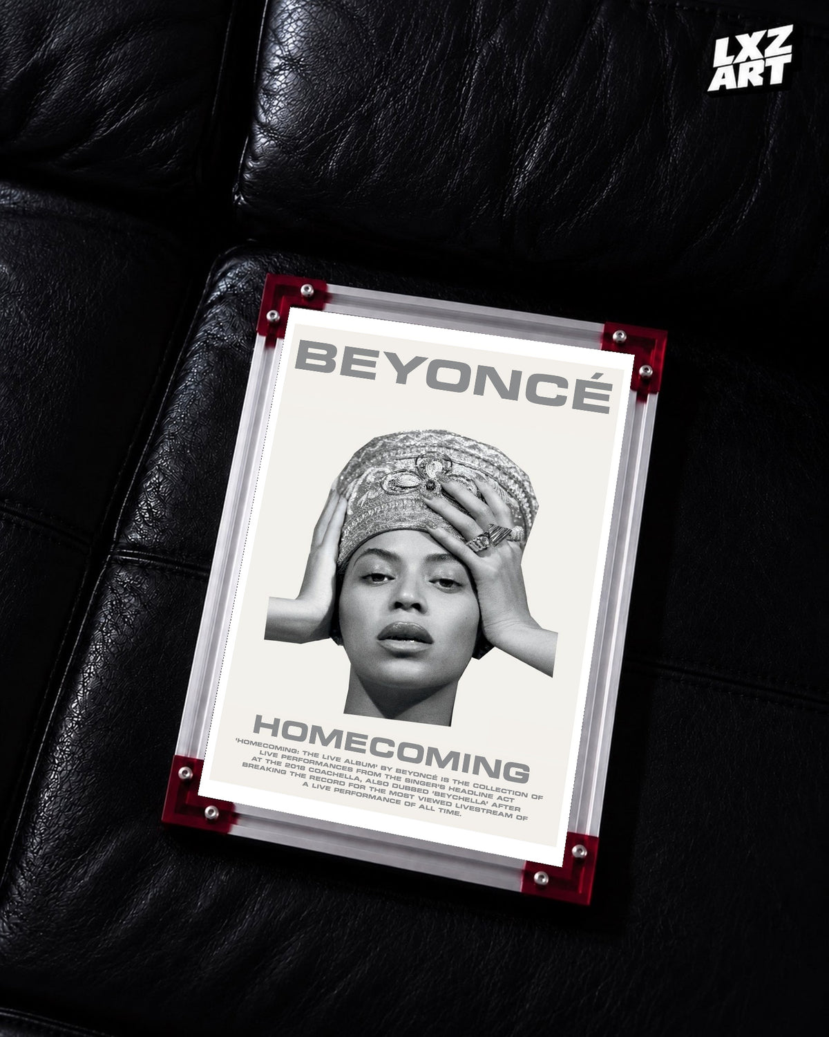 Beyoncé Homecoming: The Live Album setlist poster displayed on a black leather sofa in a red corner frame; unframed print, frame not included