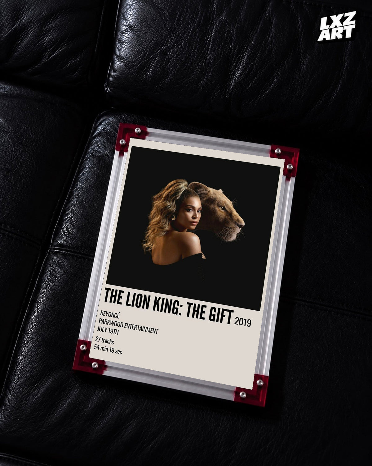 Beyoncé The Lion King: The Gift album poster displayed on a black leather sofa in a red corner frame; unframed print, frame not included