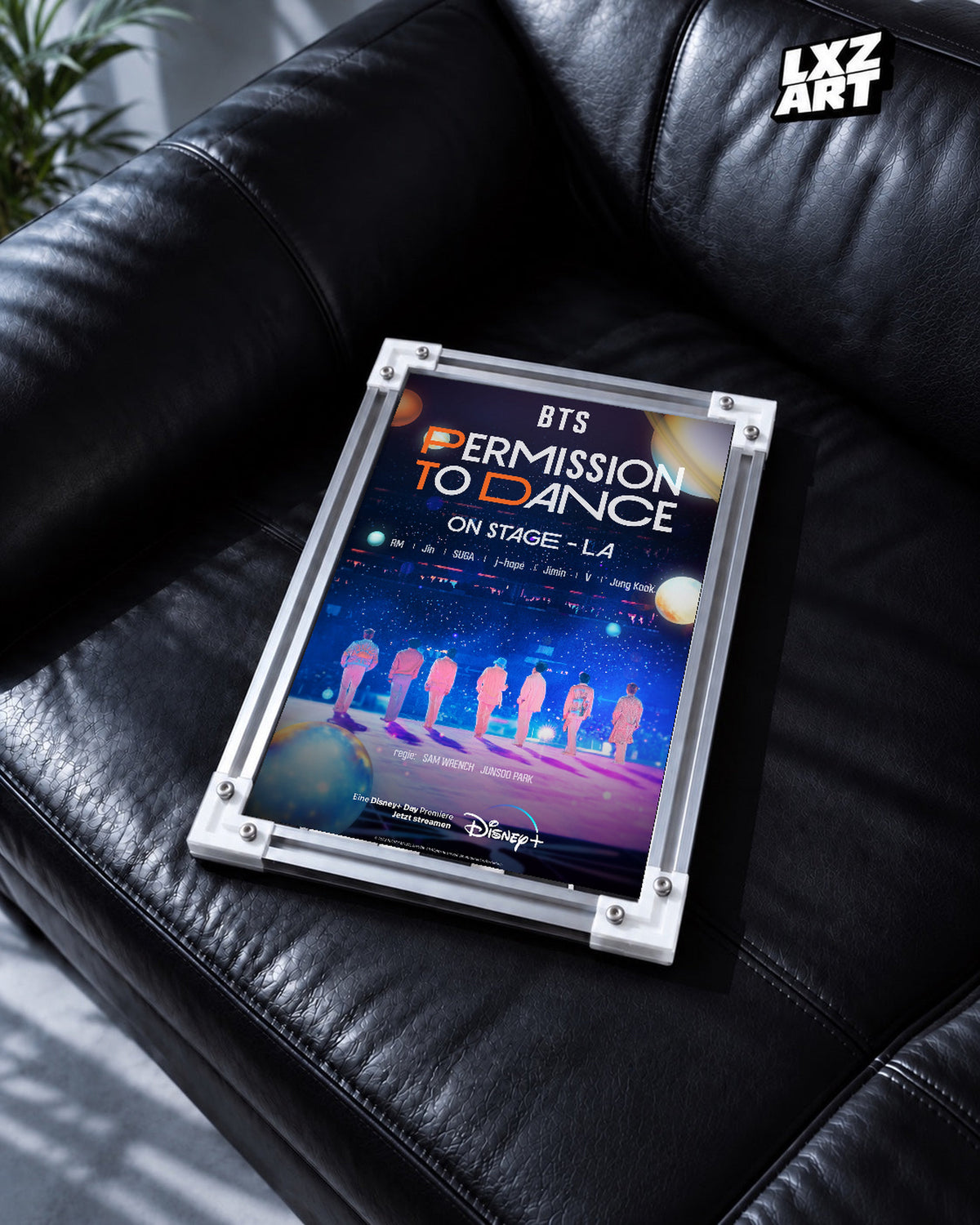 BTS Permission to Dance On Stage LA poster in the LXZART black leather sofa display. Unframed print; frame shown for display only.