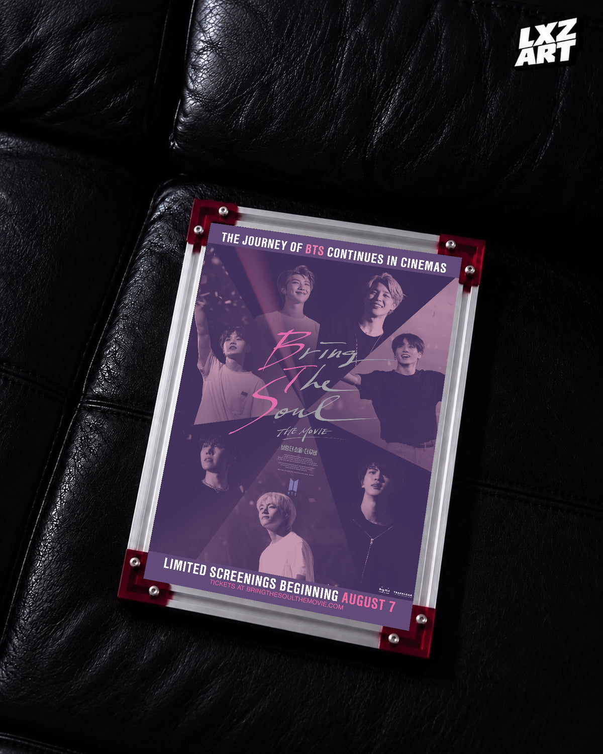 BTS Bring the Soul: The Movie concert documentary poster displayed on a black leather sofa in a red-corner frame; unframed print, frame not included