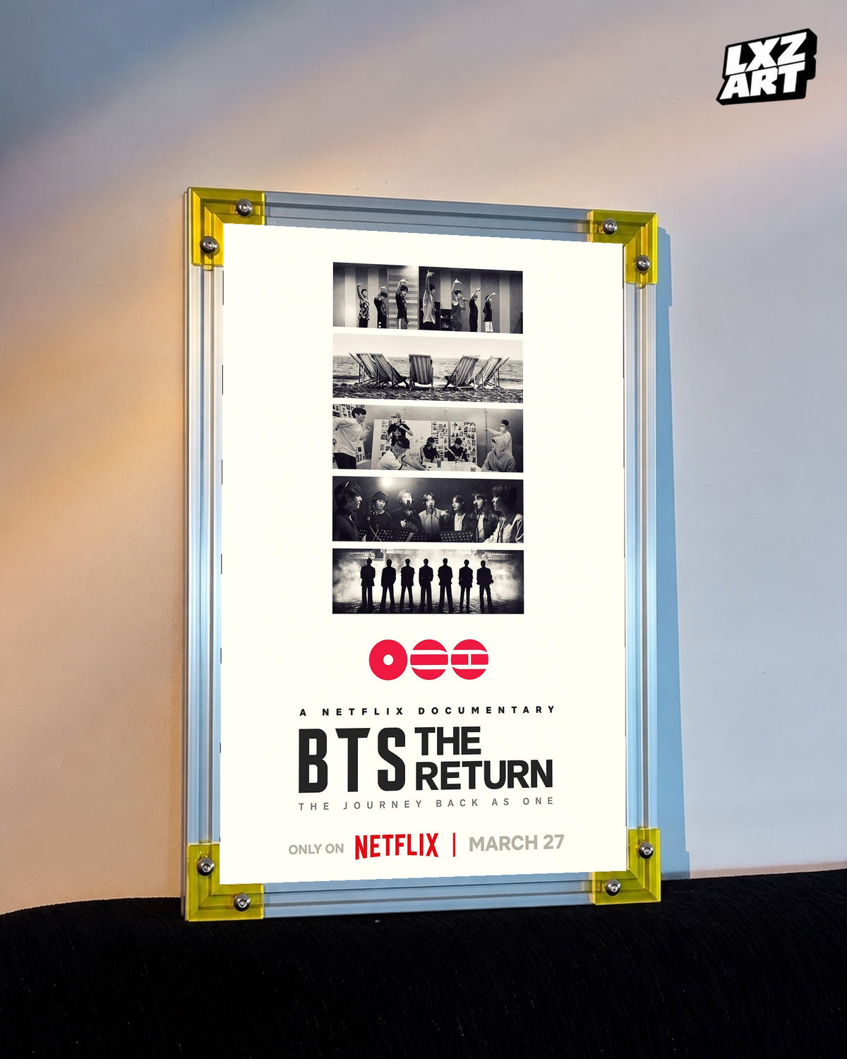 BTS The Return documentary poster displayed against a warm wall in a yellow-corner frame; unframed print, frame not included