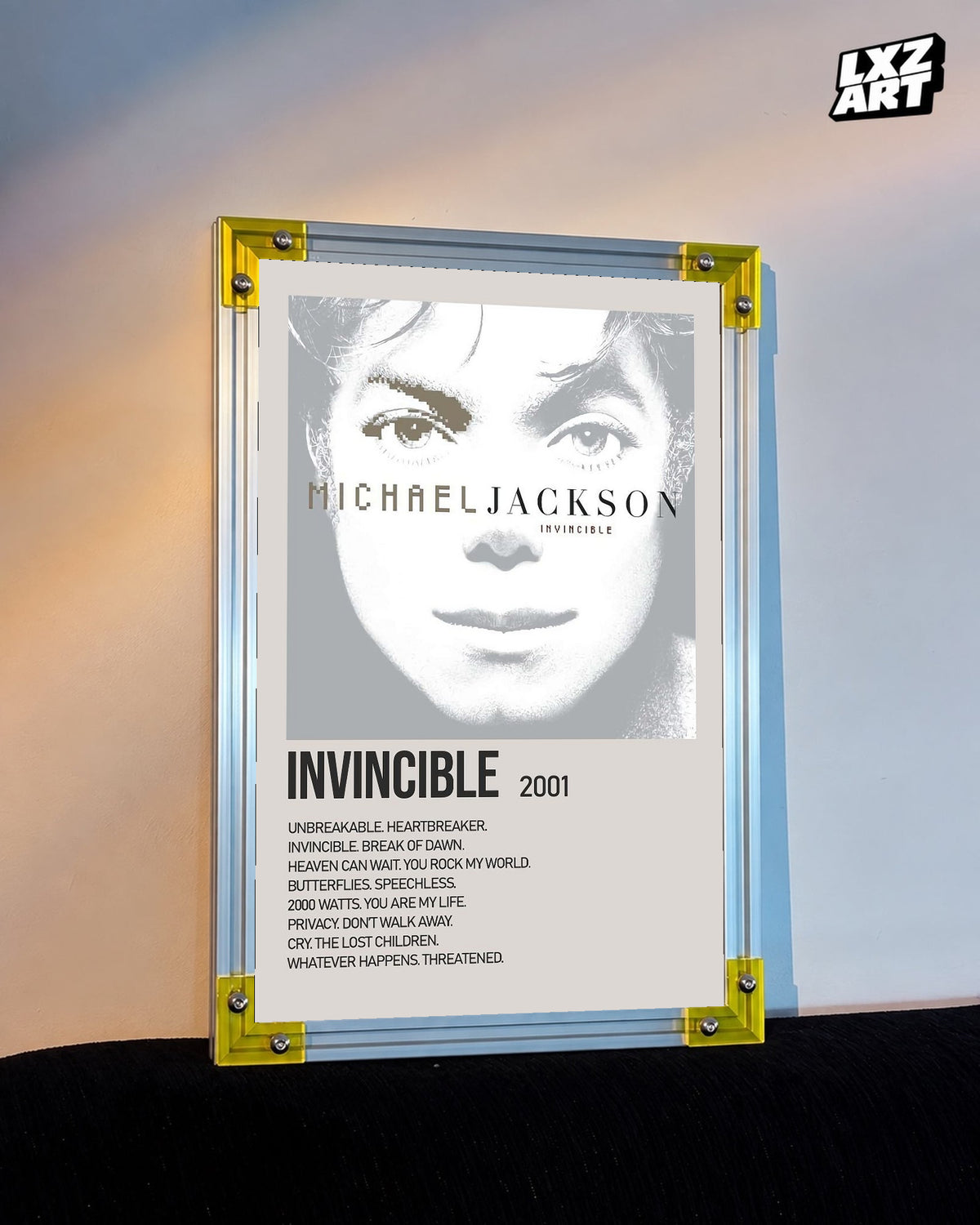 Michael Jackson Invincible tracklist poster displayed against a warm wall in a yellow corner frame; unframed print, frame not included