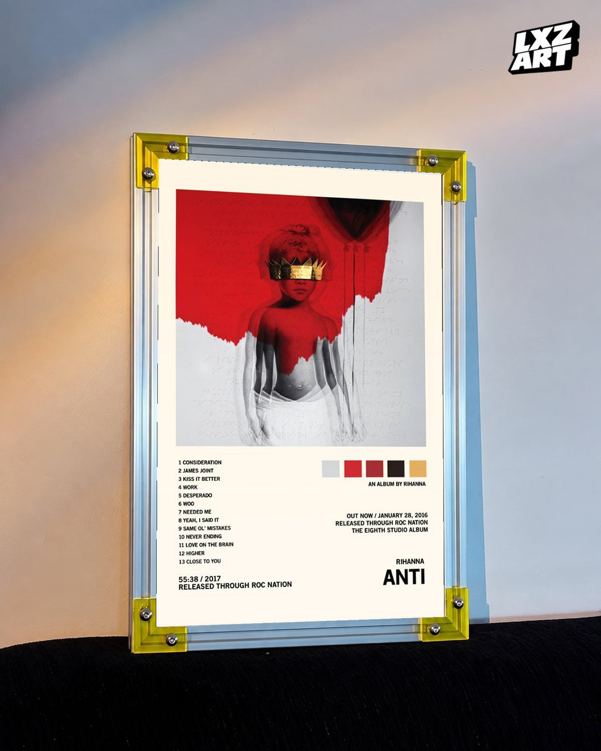 Rihanna Anti album tracklist poster displayed against a warm wall in a yellow corner frame; unframed print, frame not included