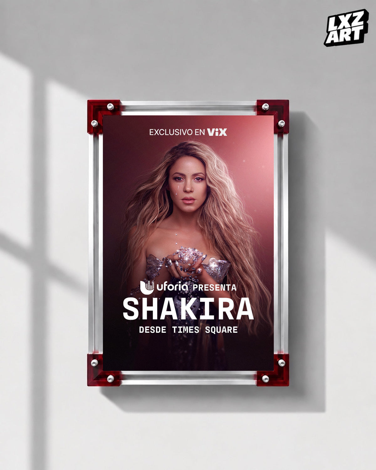 Shakira Desde Times Square live music special poster displayed on a gray wall in a red corner frame; unframed print, frame not included