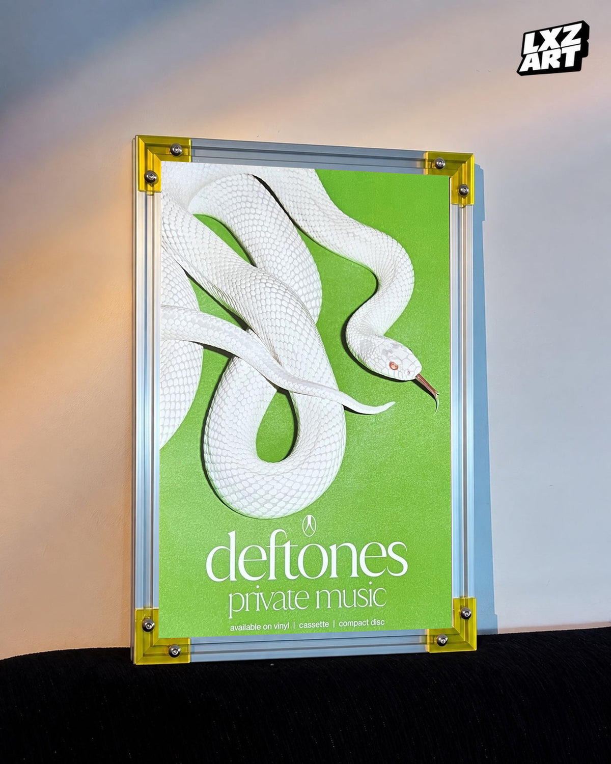 Deftones Private Music White Snake Album Poster displayed against a warm wall in a yellow-corner frame; unframed print, frame not included