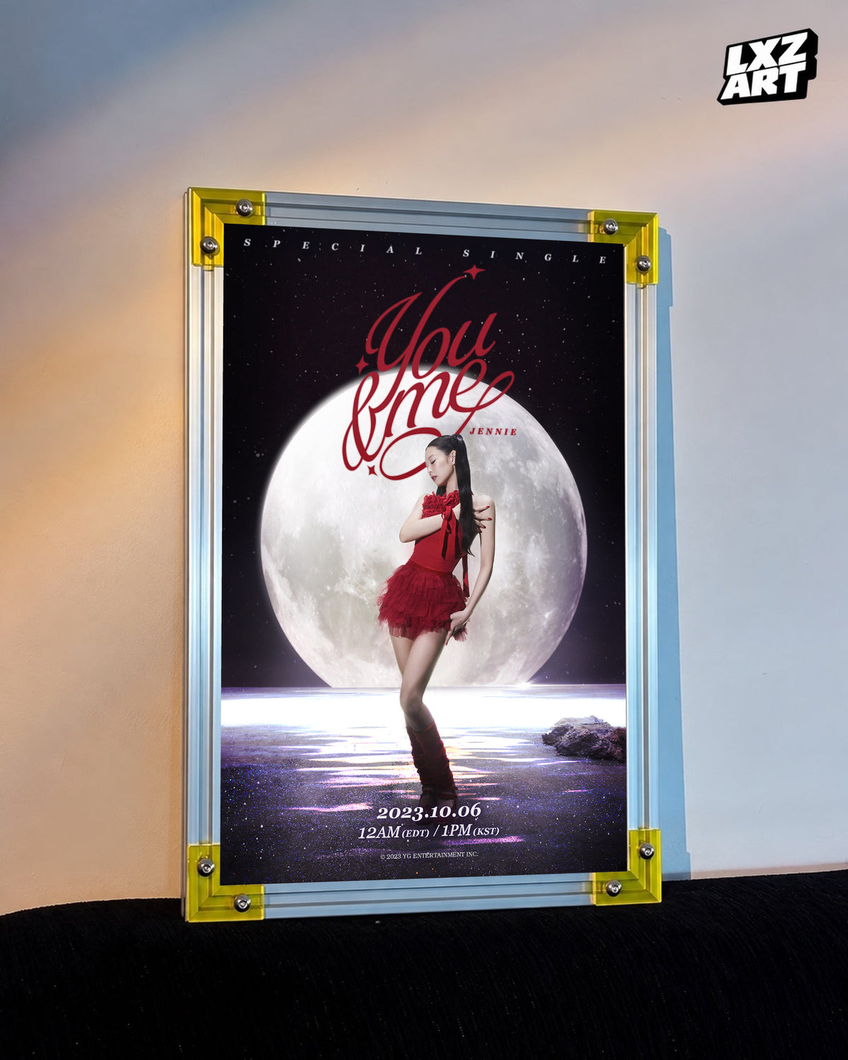 JENNIE You & Me moon title poster displayed against a warm wall in a yellow-corner frame; unframed print, frame not included