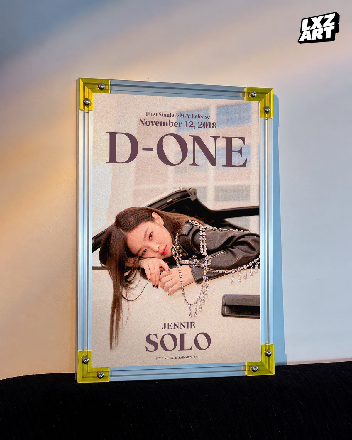 JENNIE SOLO d-one car poster displayed against a warm wall in a yellow-corner frame; unframed print, frame not included