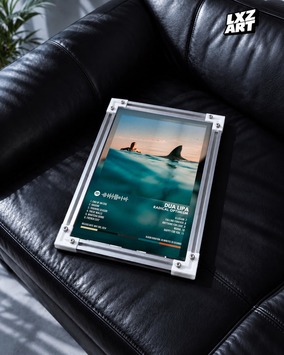 Dua Lipa Radical Optimism Ocean Tracklist Poster | Unframed Music Wall Art — black leather sofa scene; frame for display only