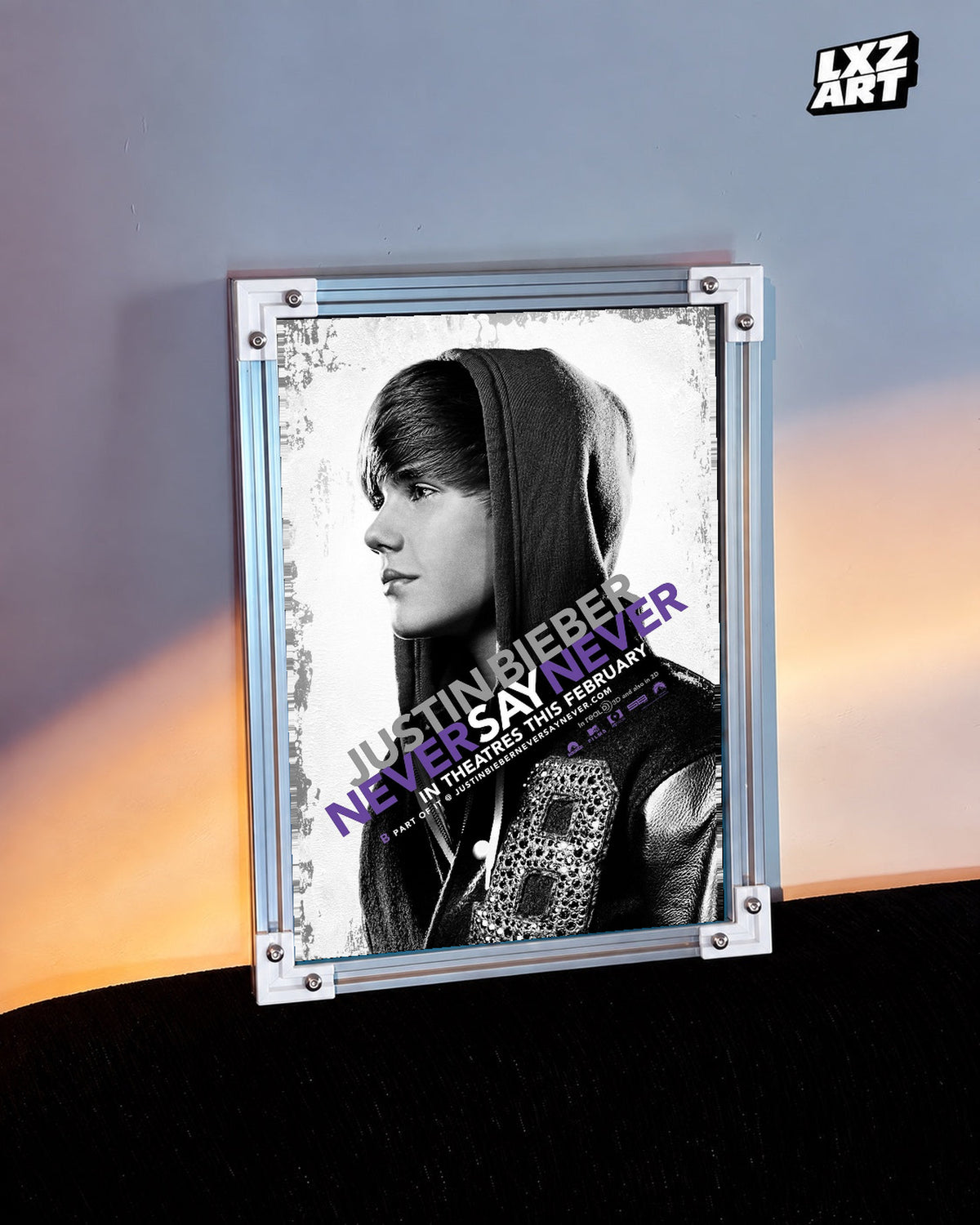 Justin Bieber Never Say Never Black and White Profile Concert Film Poster displayed in a white-corner frame against a warm-lit wall. Frame for display only.