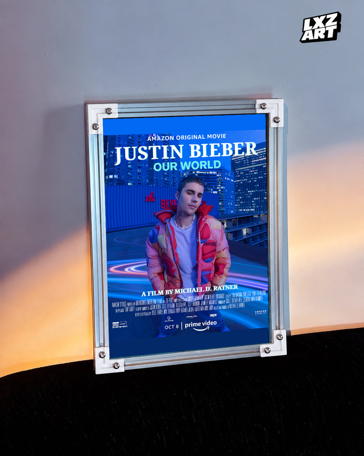 Justin Bieber Our World Blue City Concert Documentary Poster displayed in a white-corner frame against a warm-lit wall. Frame for display only.