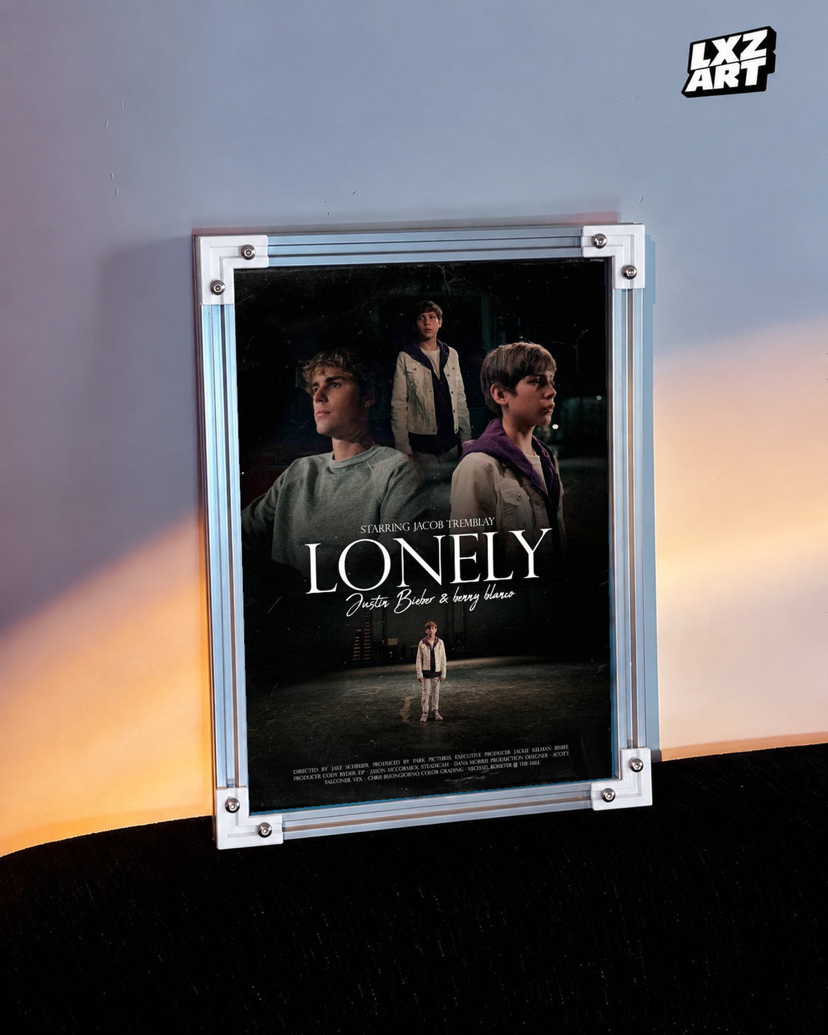 Justin Bieber & benny blanco Lonely Music Video Poster displayed in a white-corner frame against a warm-lit wall. Frame for display only.