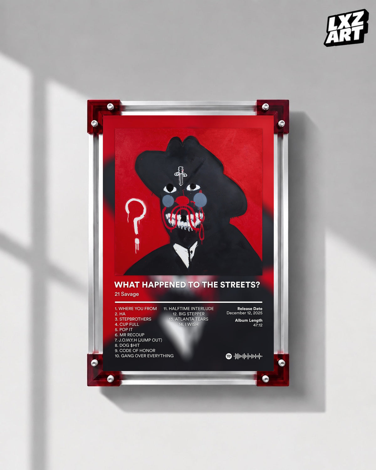 21 Savage What Happened to the Streets? Red Tracklist Poster displayed on a gray wall in a red corner frame; unframed print, frame not included