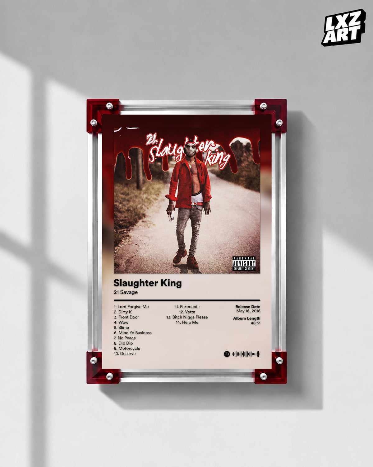 21 Savage Slaughter King Tracklist Poster displayed on a gray wall in a red corner frame; unframed print, frame not included