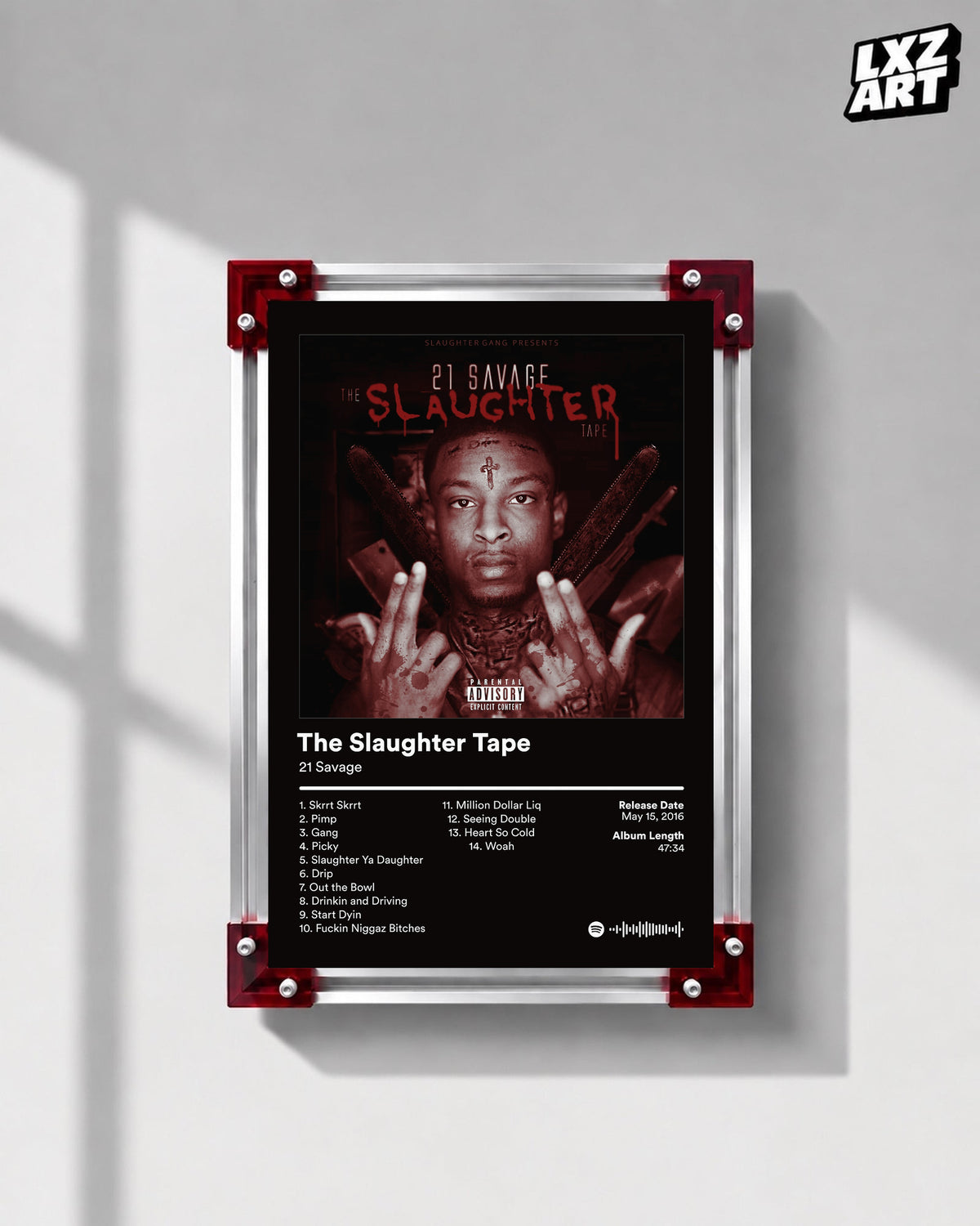 21 Savage The Slaughter Tape Tracklist Poster displayed on a gray wall in a red corner frame; unframed print, frame not included