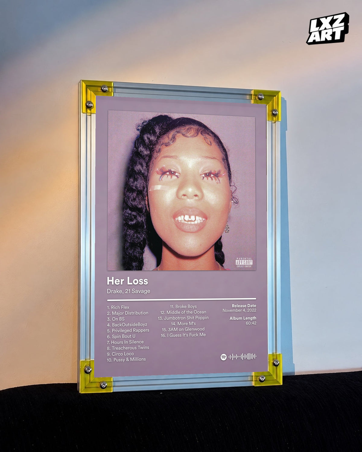 Drake & 21 Savage Her Loss Mauve Tracklist Poster displayed on a warm wall in a yellow corner frame; unframed print, frame not included