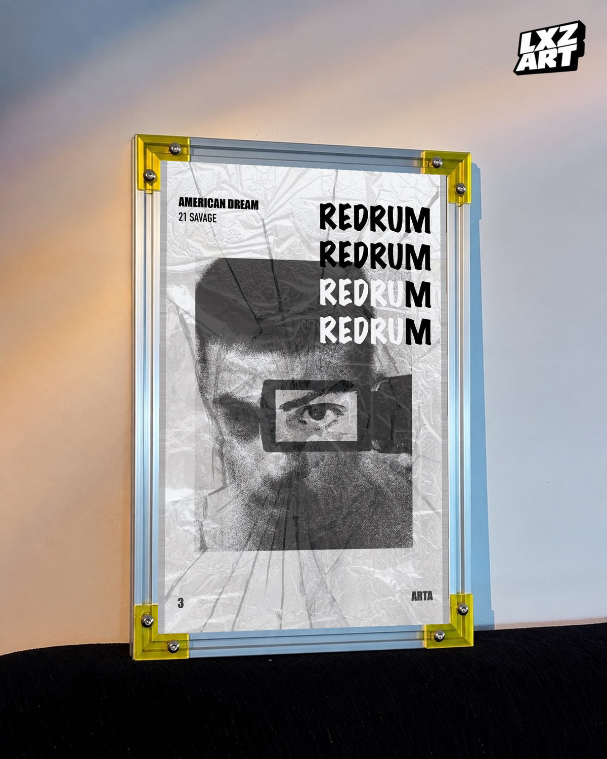 21 Savage Redrum Monochrome Eye Poster displayed on a warm wall in a yellow corner frame; unframed print, frame not included