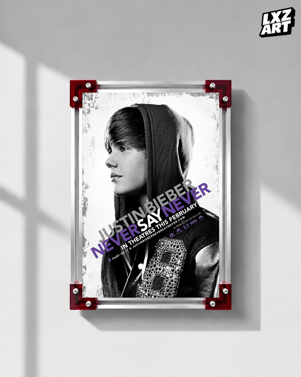 Justin Bieber Never Say Never Black and White Profile Concert Film Poster displayed on a gray wall in a red corner frame; unframed print, frame not included